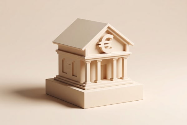 Un bâtiment d'une banque avec le signe €